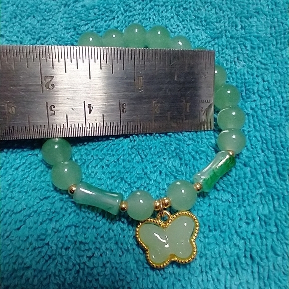 Goldtone green butterfly faux jade stretch bracelet - Picture 3 of 4